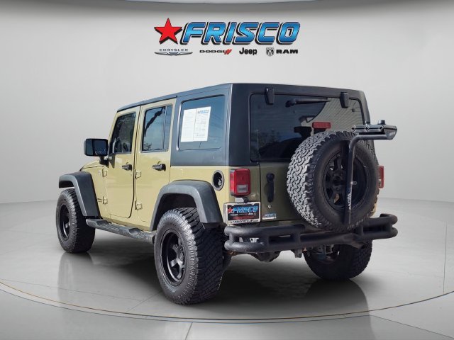 Used 2013 Green Jeep Unlimited Sport image 5