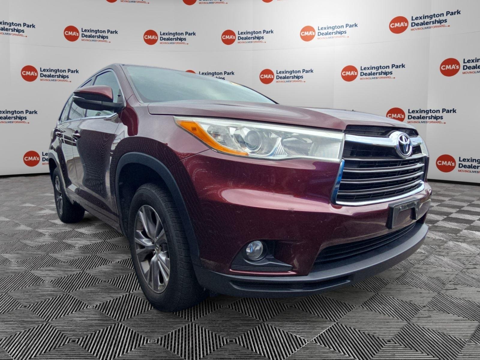 Used 2014 Ooh La La Rouge Mica Toyota LE Plus image 1