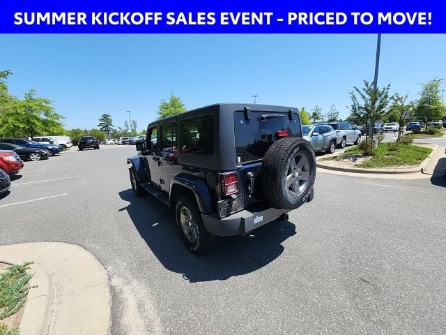 Used 2013 Blue Jeep Unlimited Sport image 12