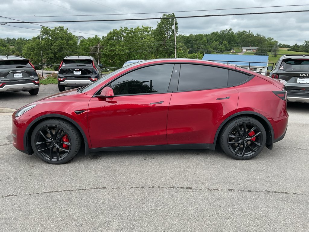 Used 2025 Ultra Red Tesla Performance image 6