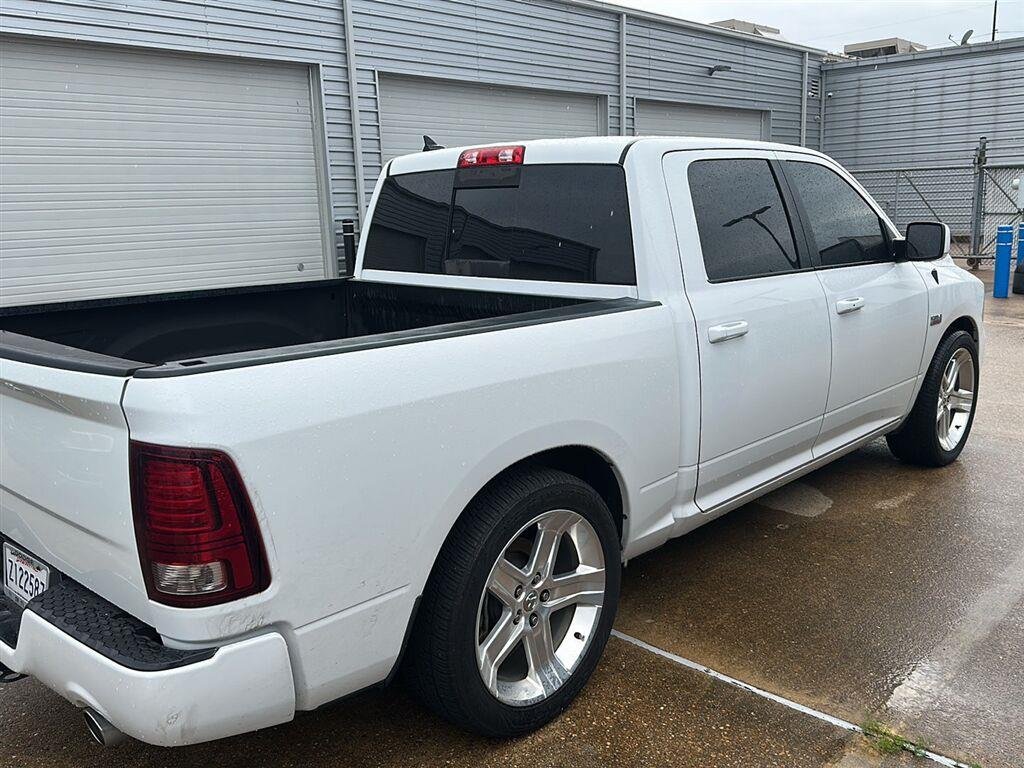 Used 2017 Bright White Clearcoat Ram Sport image 4