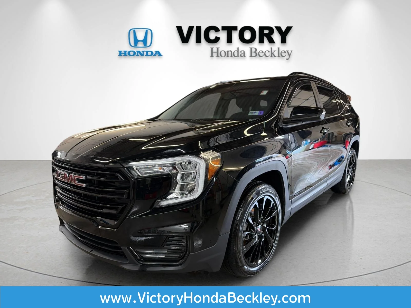 Used 2023 Ebony Twilight Metallic GMC SLE image 1