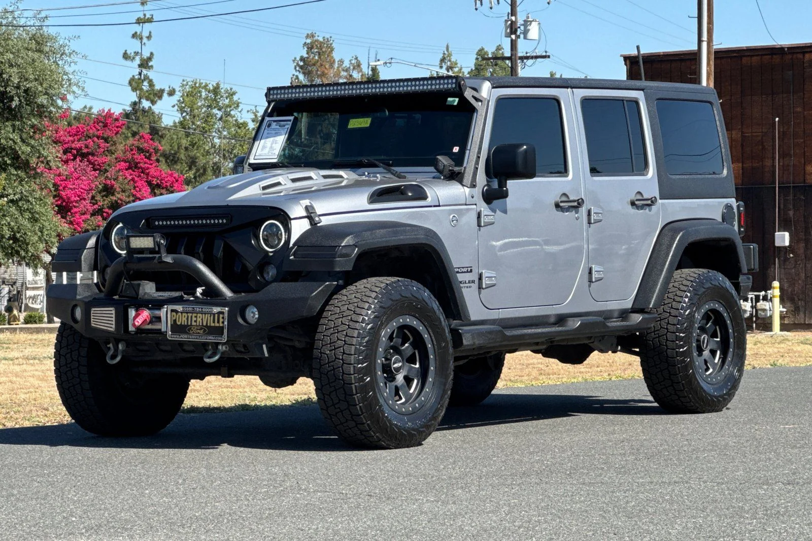 Used 2016 Billet Silver Metallic Clearcoat Jeep Unlimited Sport image 10