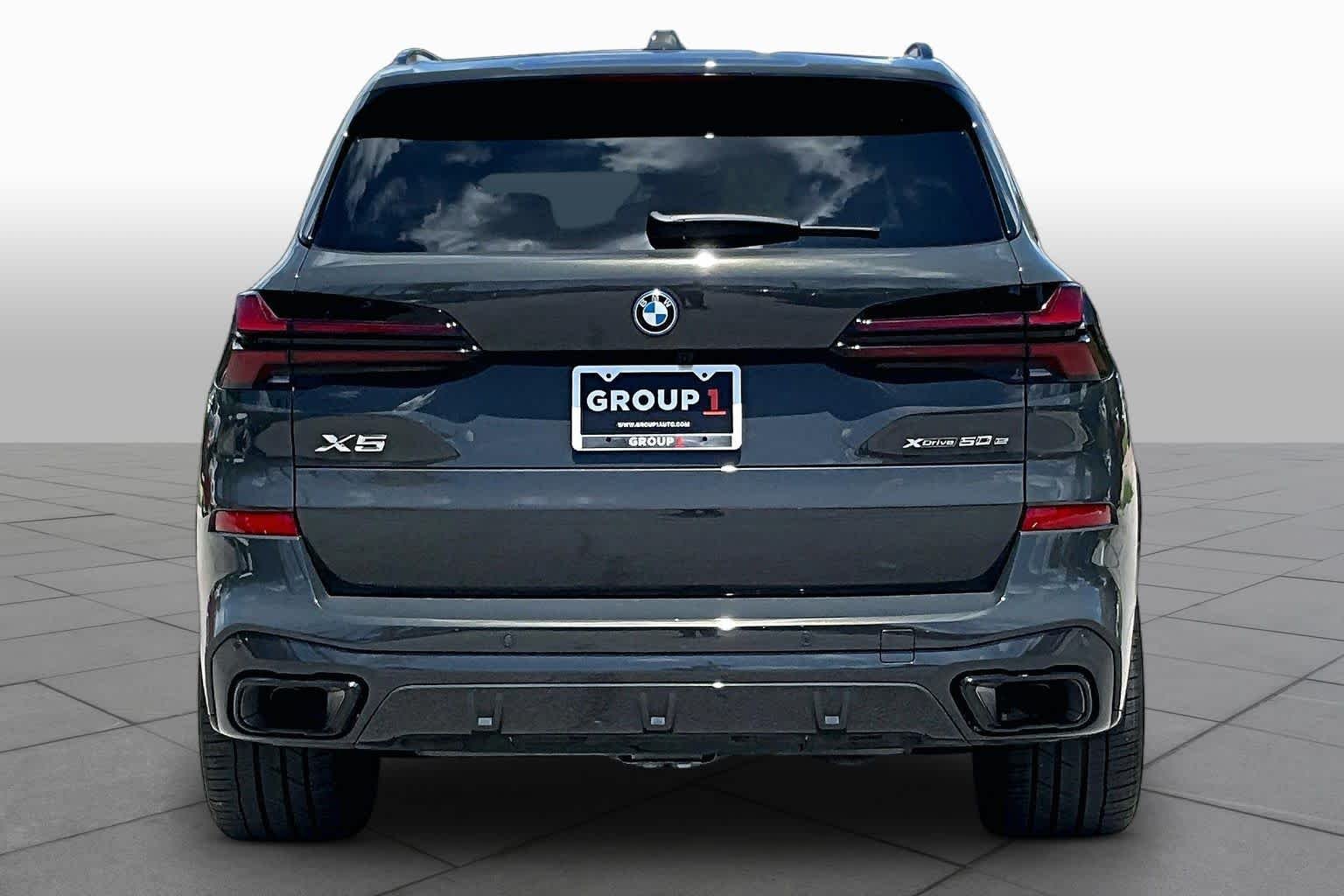 Used 2026 Dravit Grey Metallic BMW xDrive50e image 4
