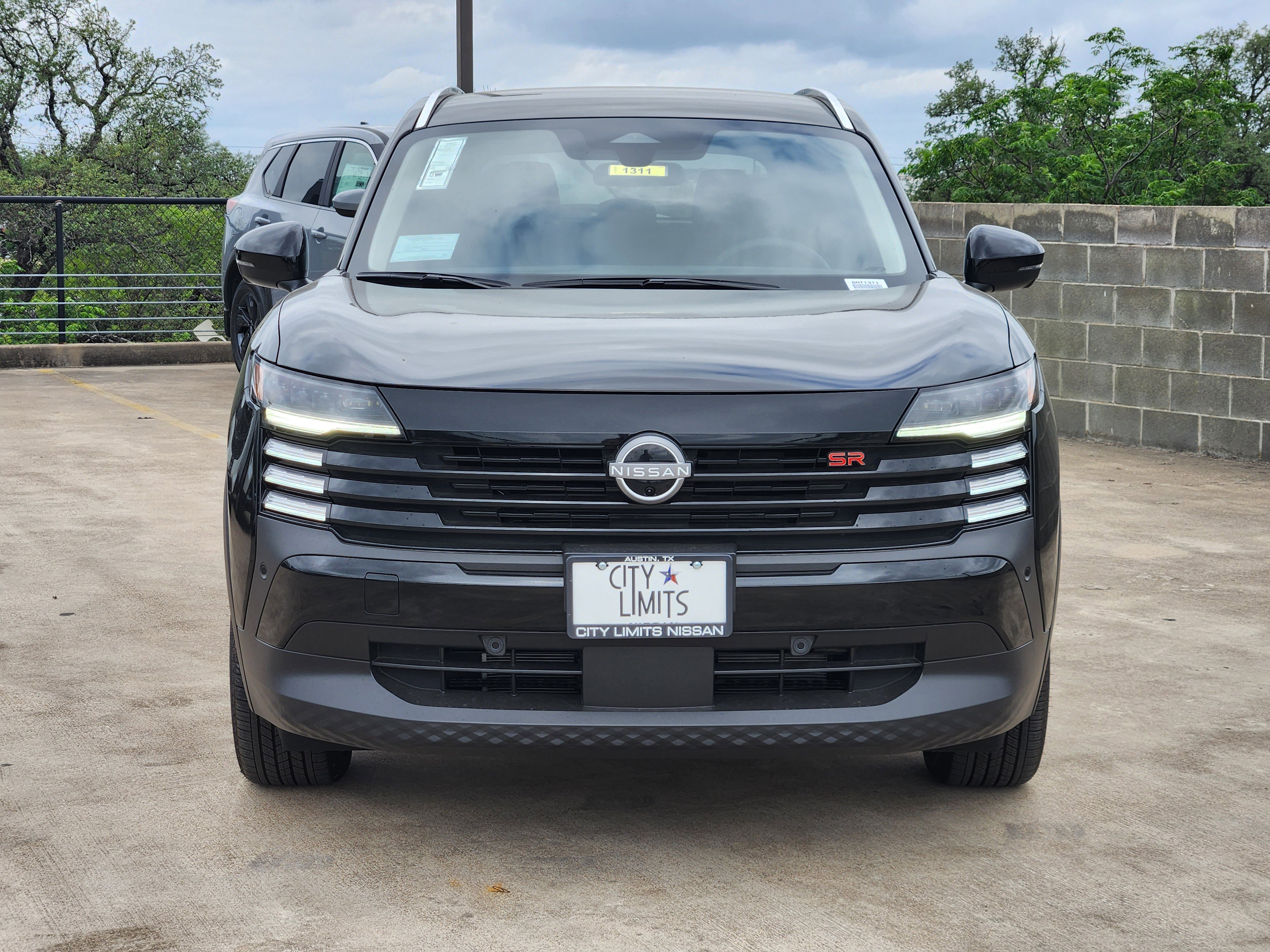 New 2026 Super Black Nissan SR image 2