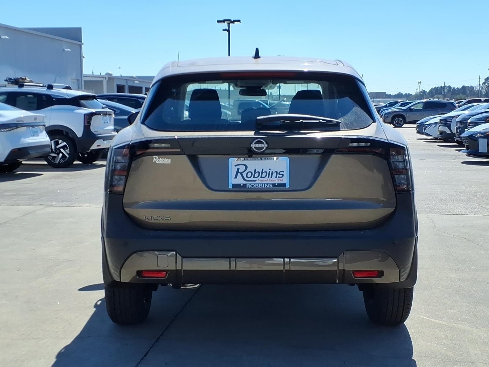 2026 Nissan Kicks S Brown at Robbins Nissan