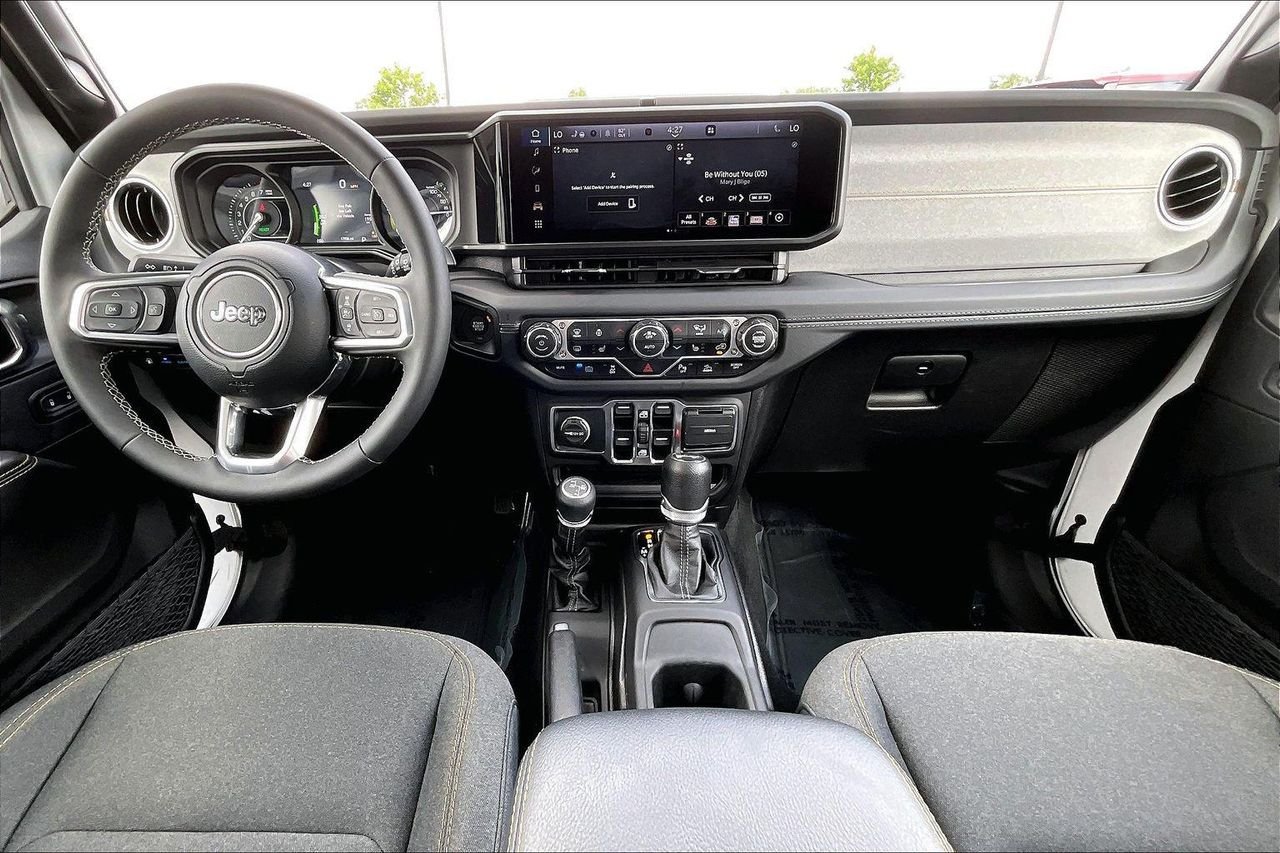 Used 2025 Bright White Clearcoat Jeep Sahara 4xe image 9