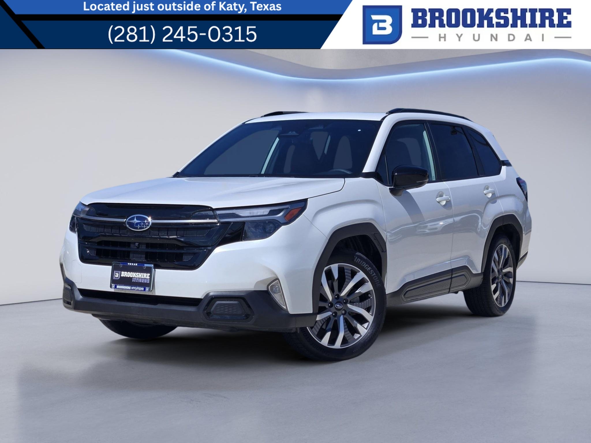 Used 2025 Crystal White Pearl Subaru Touring image 1