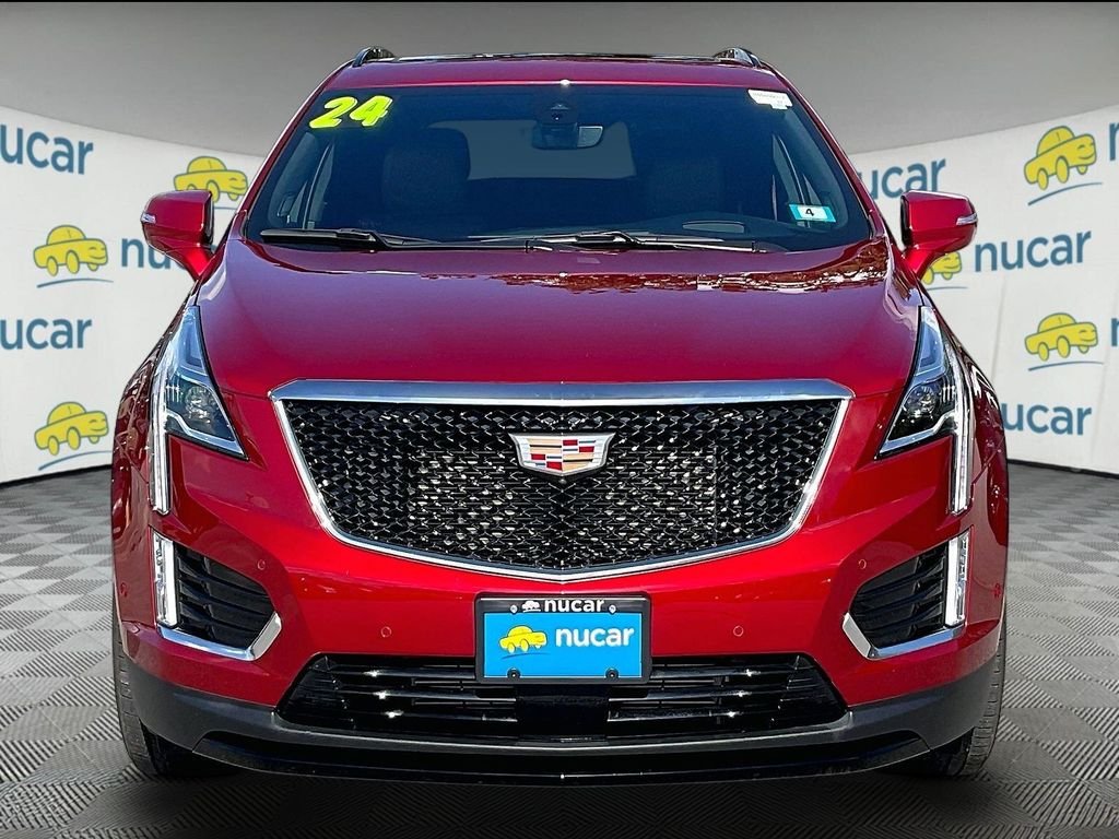 Used 2024 Radiant Red Tintcoat Cadillac Sport image 2