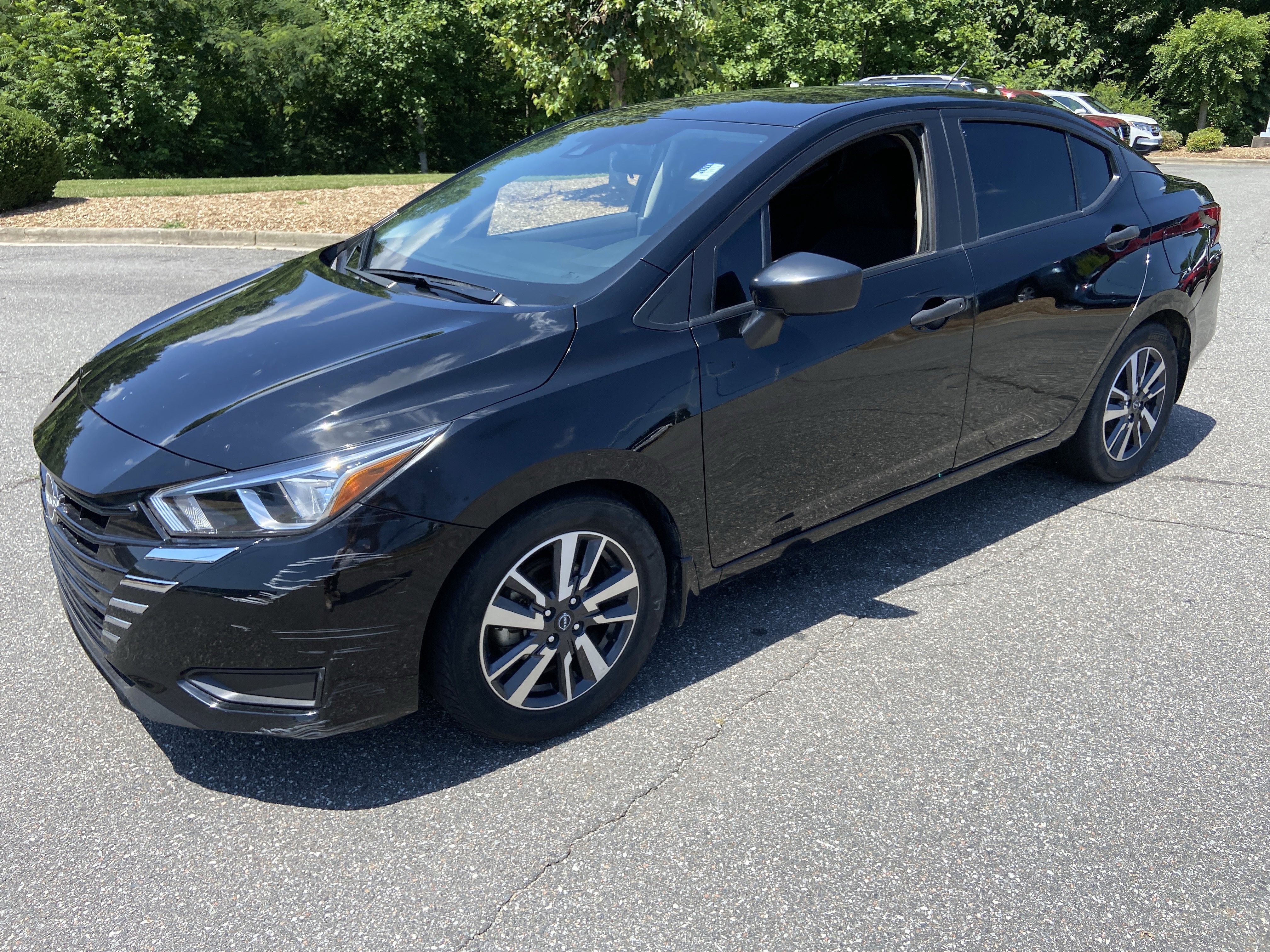 Used 2023 Super Black Nissan S image 1