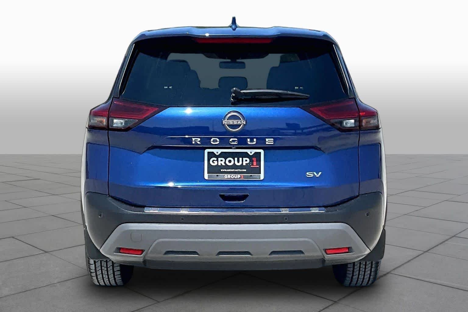 Used 2023 Caspian Blue Metallic Nissan SV image 9