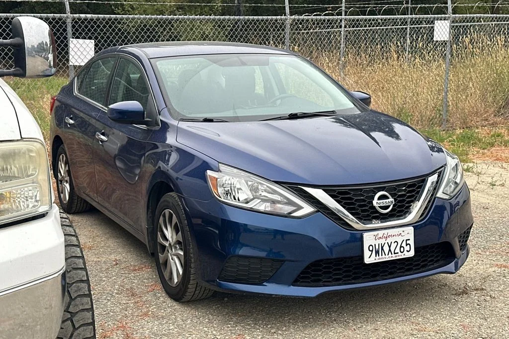 Used 2016 Deep Blue Pearl Nissan SV image 2
