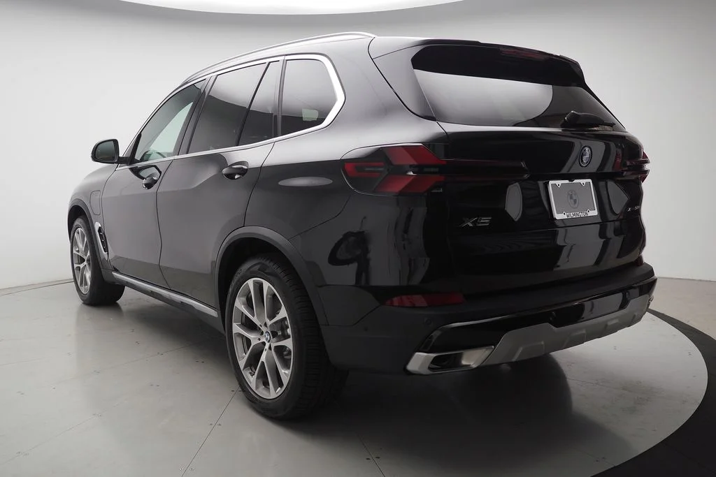 New 2026 Black Sapphire Metallic BMW xDrive50e image 4