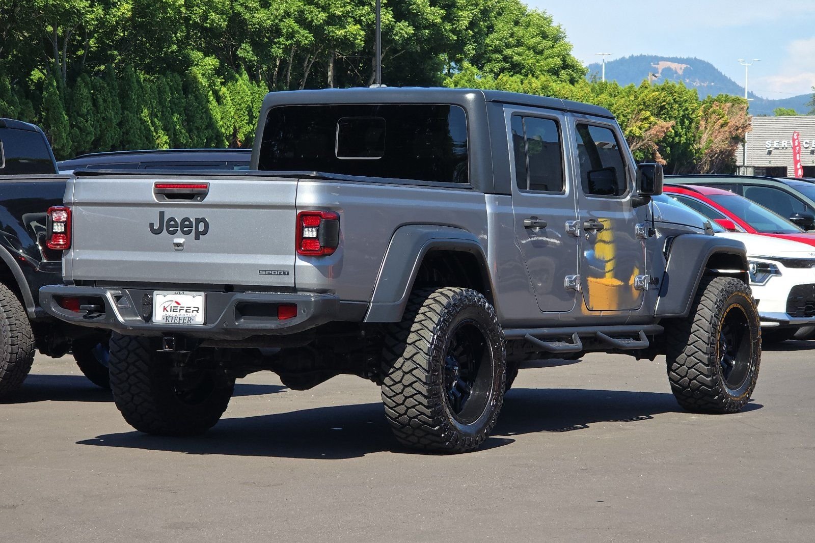 Used 2020 Silver Jeep Sport image 4