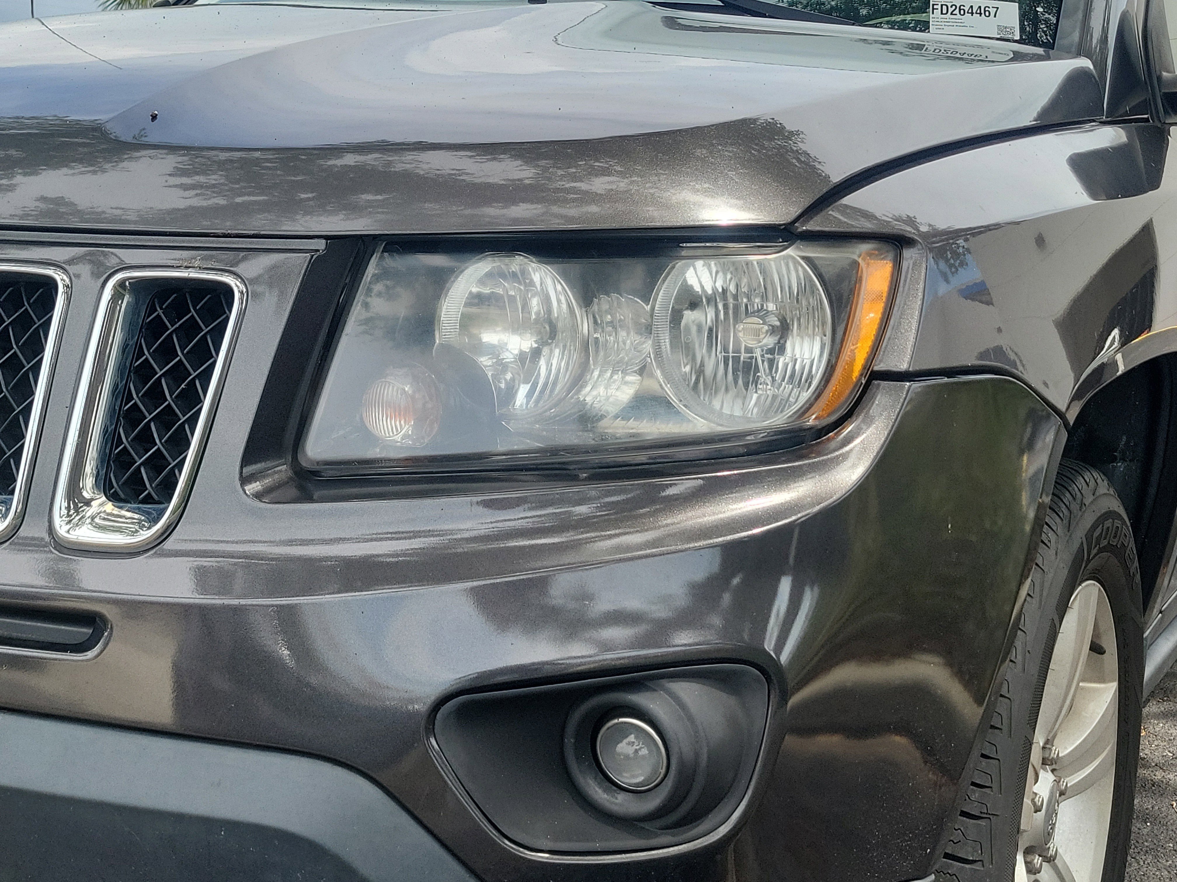 Used 2015 Granite Crystal Metallic Clearcoat Jeep Sport image 4