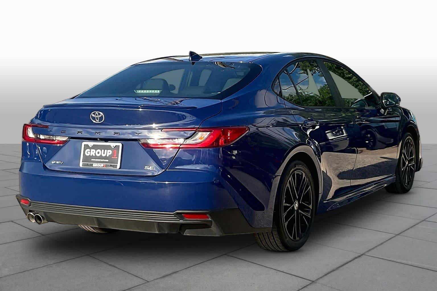 Used 2025 Reservoir Blue Toyota SE image 13