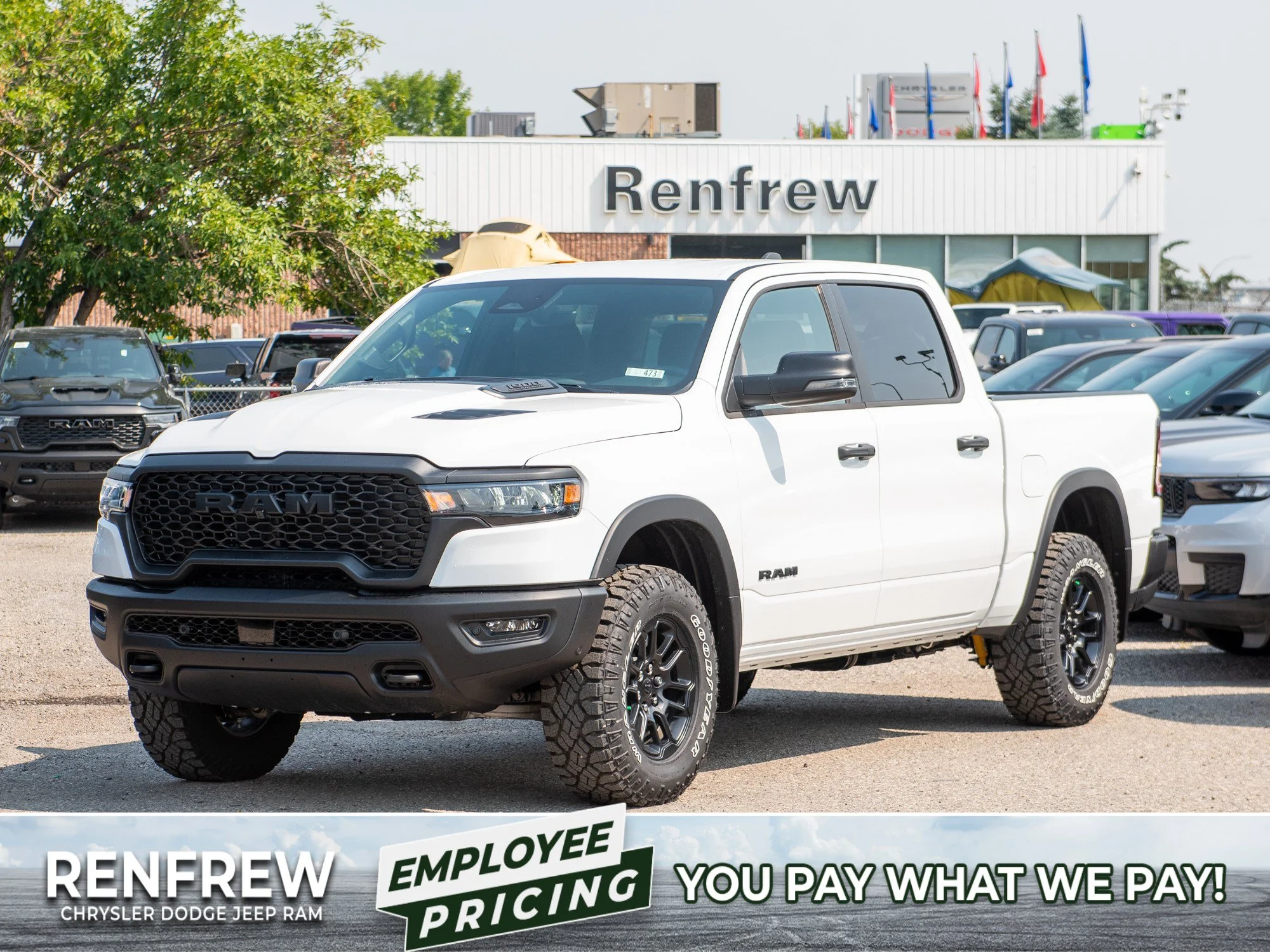 New 2026 White RAM Rebel* Crew Cab 4x4, 33 Inch A/T Tires, Factory Suspension Lift, Bilstein Shocks image 1