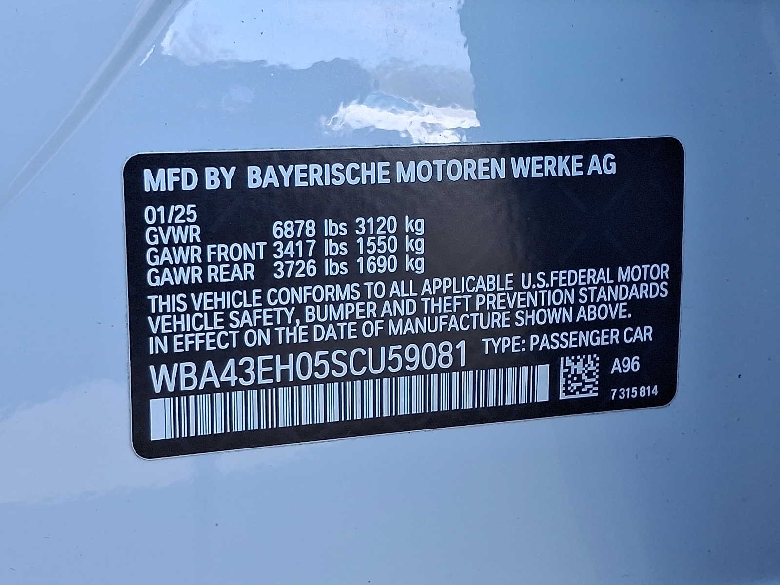 Used 2025 Mineral White Metallic BMW 750e xDrive image 28