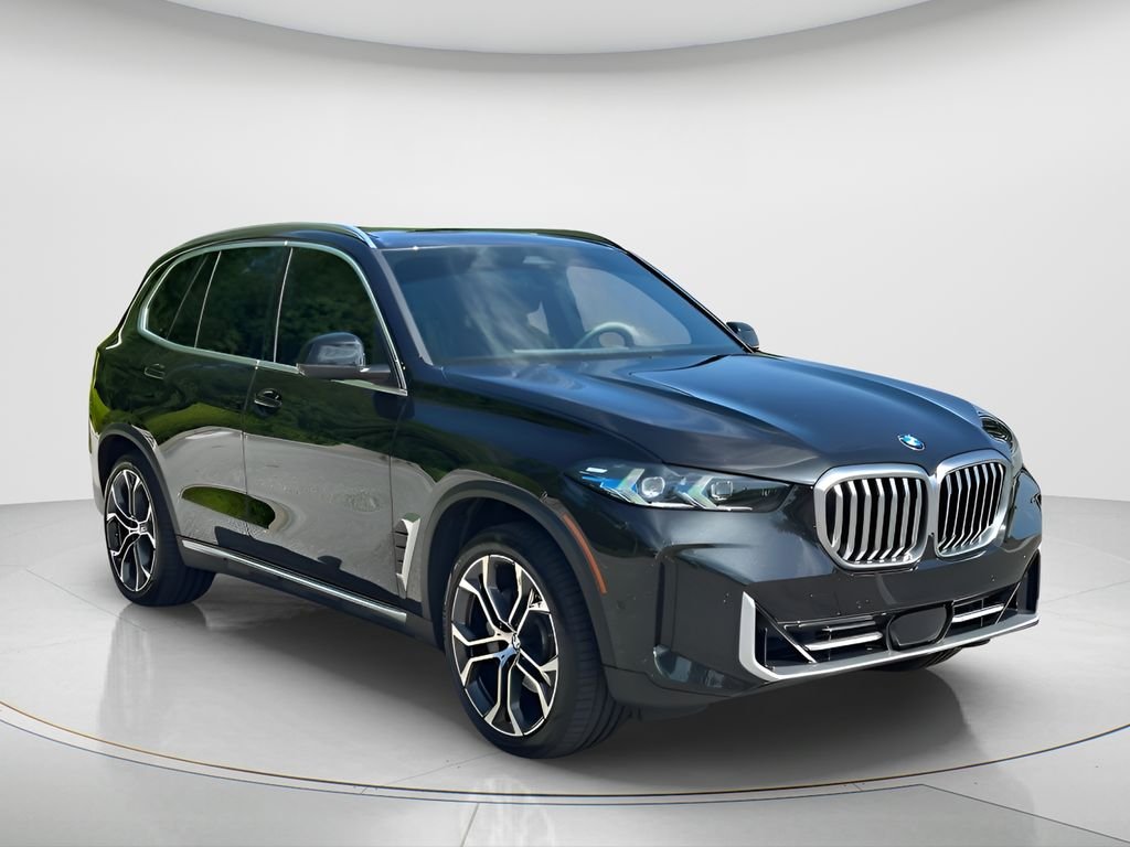 Certified Used 2025 Black Sapphire Metallic BMW xDrive40i image 3