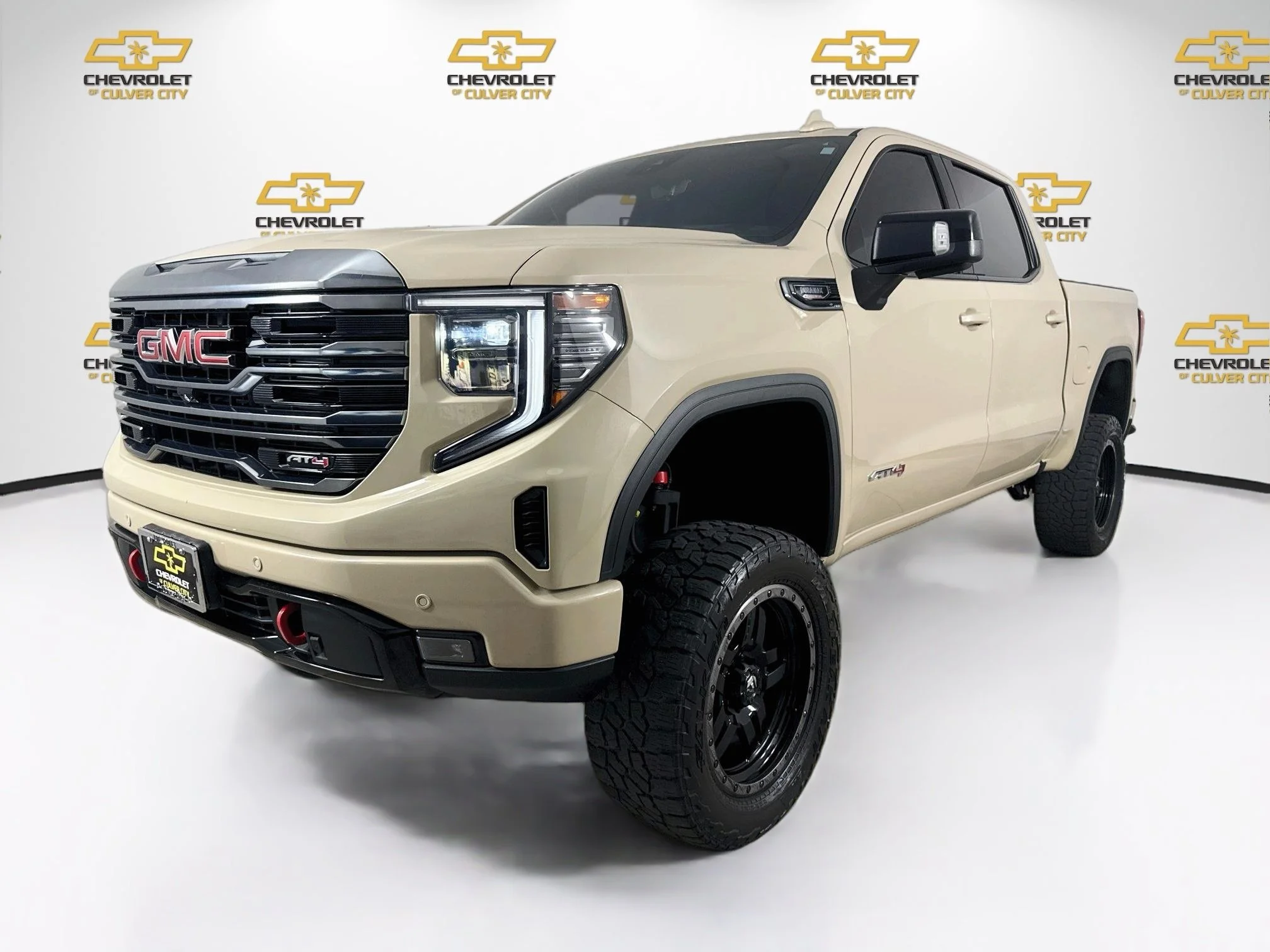Used 2023 DESERT SAND METALLIC GMC AT4 image 3