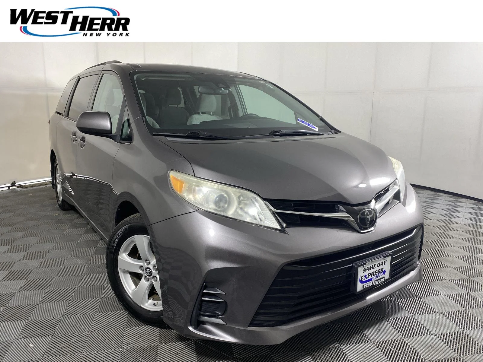 Used 2018 Predawn Gray Mica Toyota LE image 1