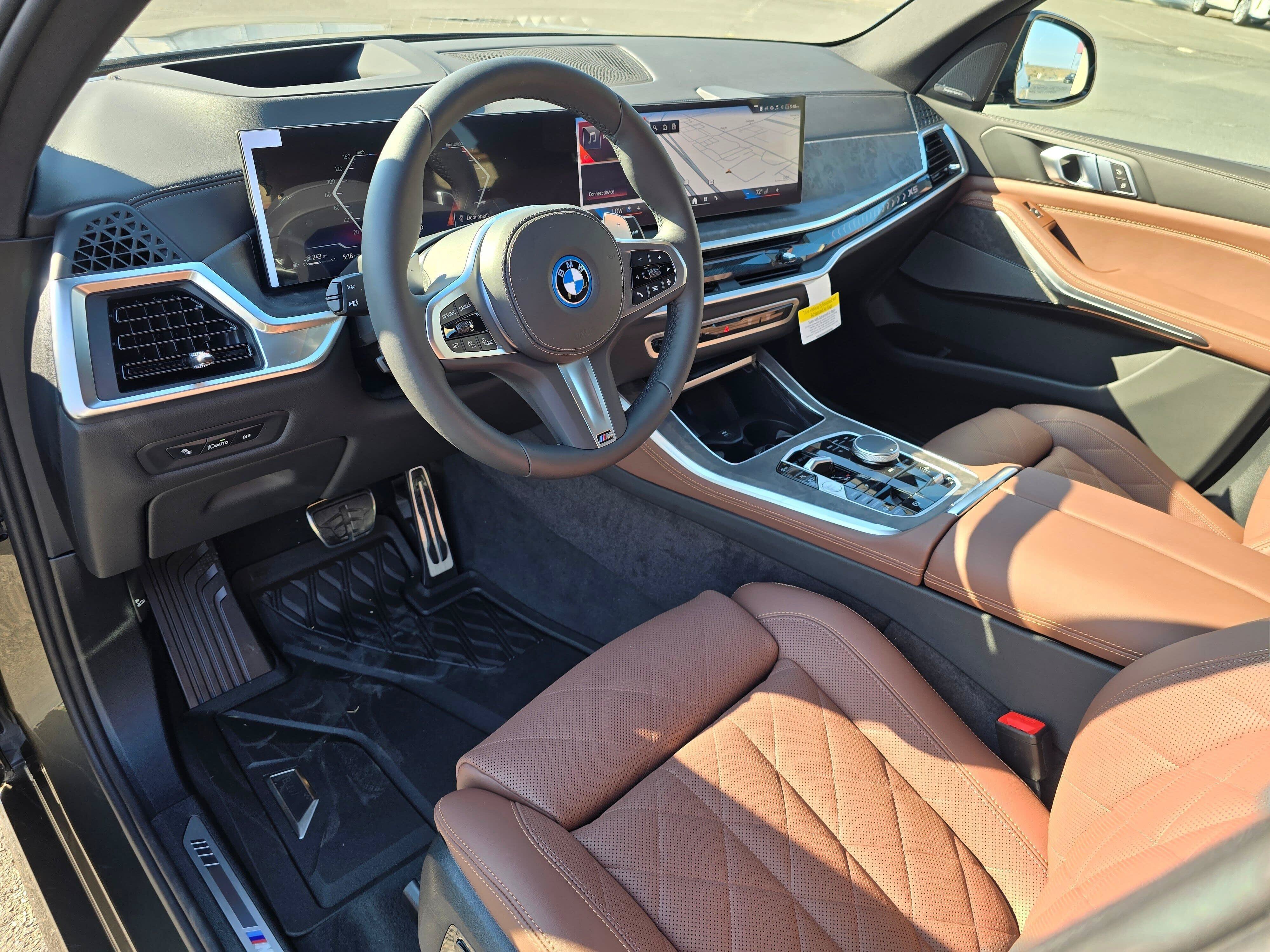 New 2026 Manhattan Green Metallic BMW xDrive50e image 2