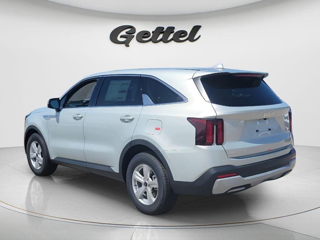 New 2026 Ivory Silver Kia LX image 7