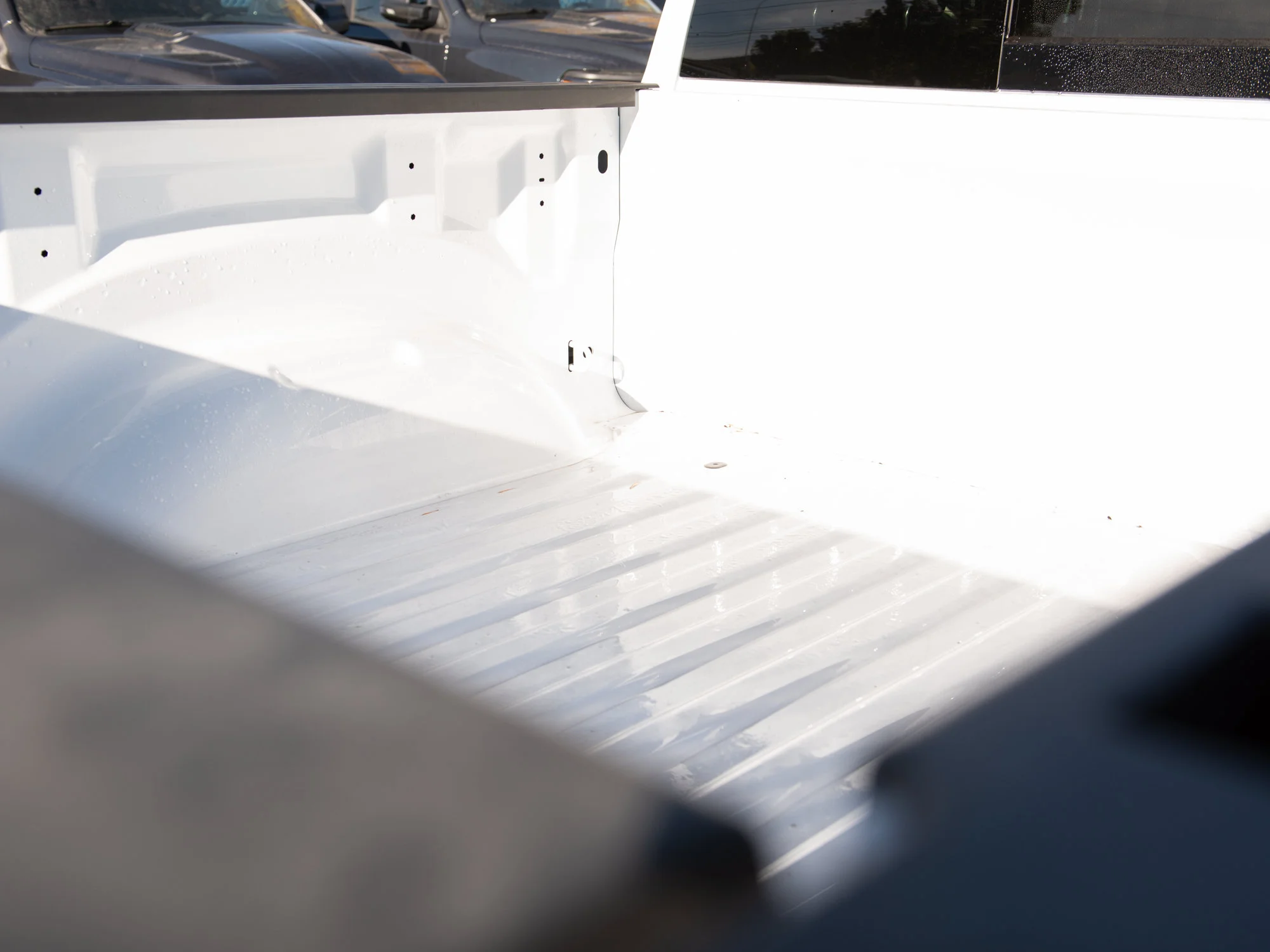 New 2026 White RAM Rebel G/T* Crew Cab 4x4, Pano Sunroof, Passive Cold End Exhaust, Passenger Screen image 6
