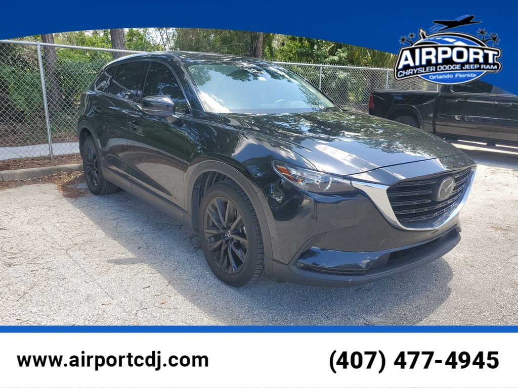 Used 2023 Black Mazda Touring Plus image 1