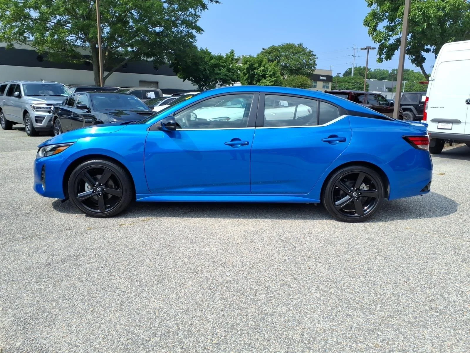 Used 2025 Electric Blue Metallic Nissan SR image 9