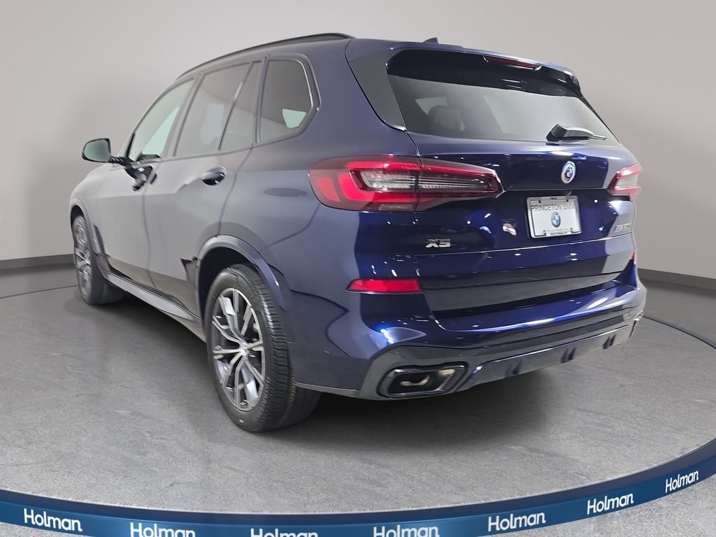 Used 2022 Tanzanite Blue II Metallic BMW M50i image 8