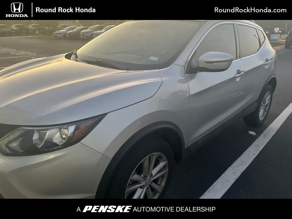 Used 2018 Brilliant Silver Nissan SV image 1