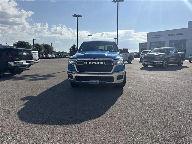 Used 2025 Hydro Blue Pearlcoat RAM Big Horn/Lone Star 4x4 Crew Cab 144.5 in. WB image 2