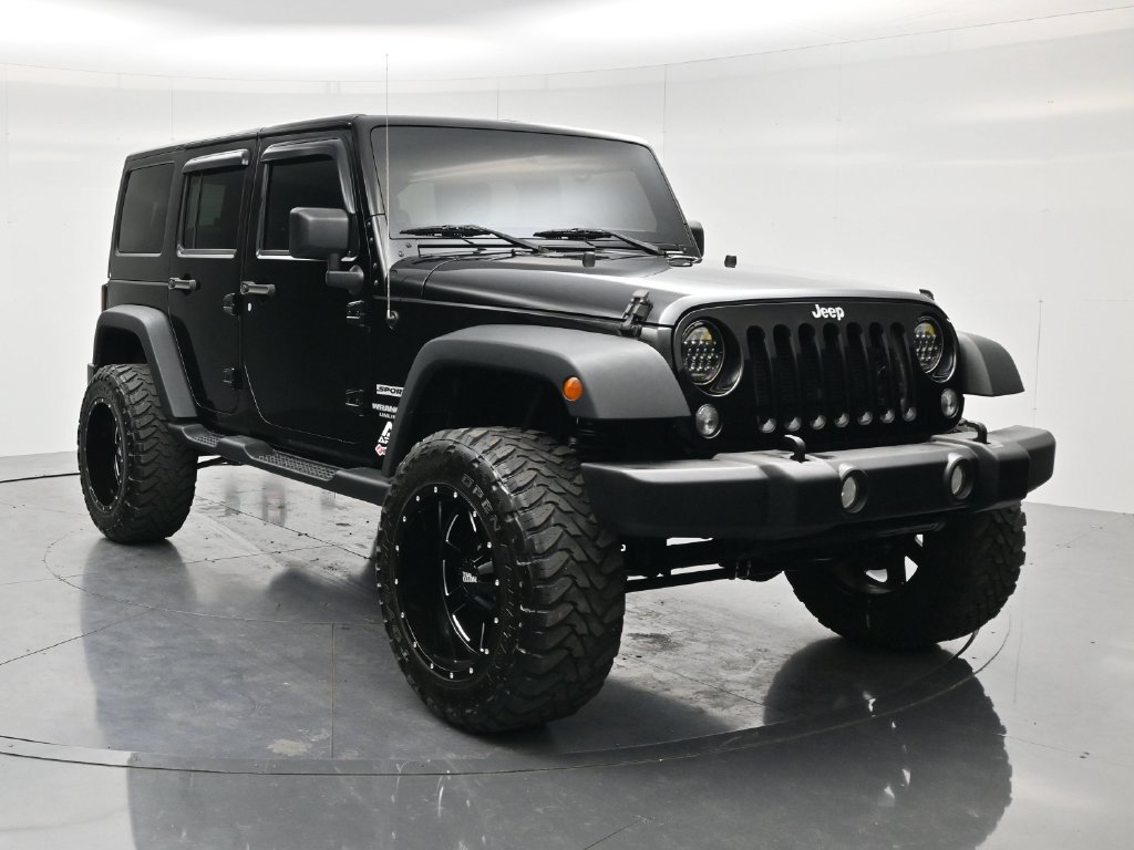 Used 2014 Black Clearcoat Jeep Unlimited Sport image 3