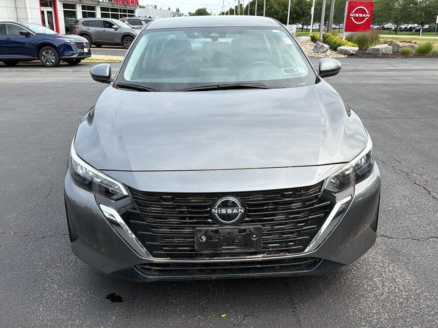 Used 2024 Gun Metallic Nissan SV image 2