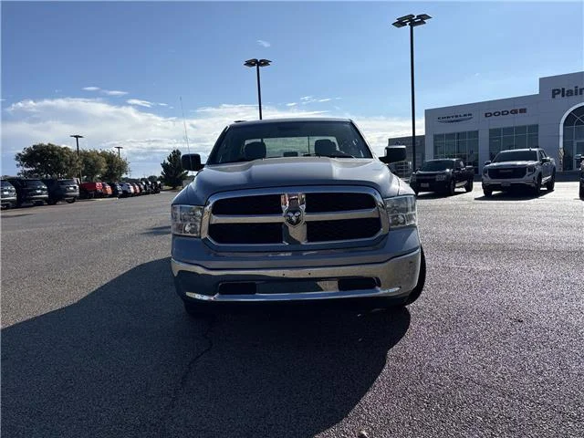 Used 2024 Granite Crystal Metallic Clearcoat RAM SLT 4x4 Quad Cab 6.3 ft. box 140 in. WB image 2