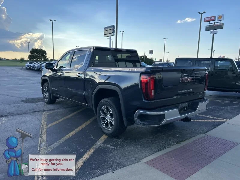Used 2025 Titanium Rush Metallic GMC SLT image 3