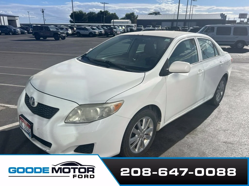 Used 2009 Super White Toyota LE image 1