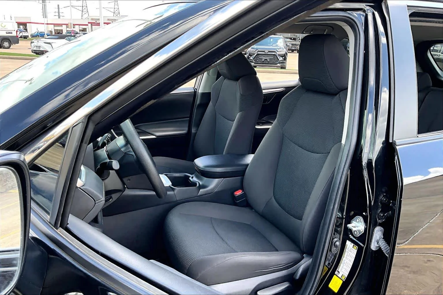 Used 2024 Midnight Black Metallic Toyota Hybrid LE image 8