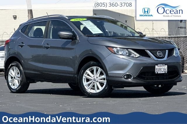 Used 2019 Gun Metallic Nissan SV image 1
