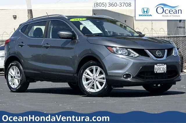 Used 2019 Gun Metallic Nissan SV image 1