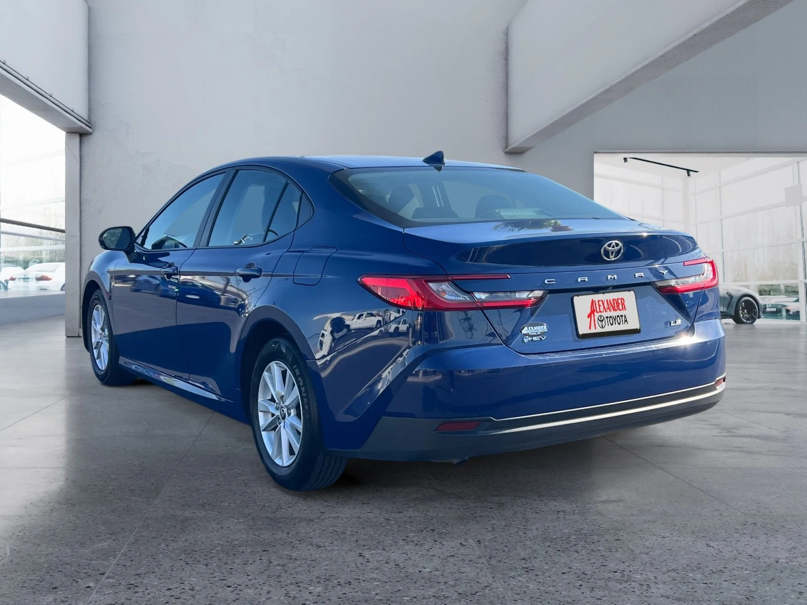 Used 2025 Reservoir Blue Toyota LE image 3