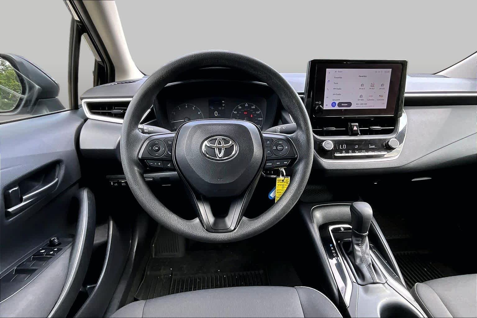 Used 2024 Midnight Black Metallic Toyota LE image 11