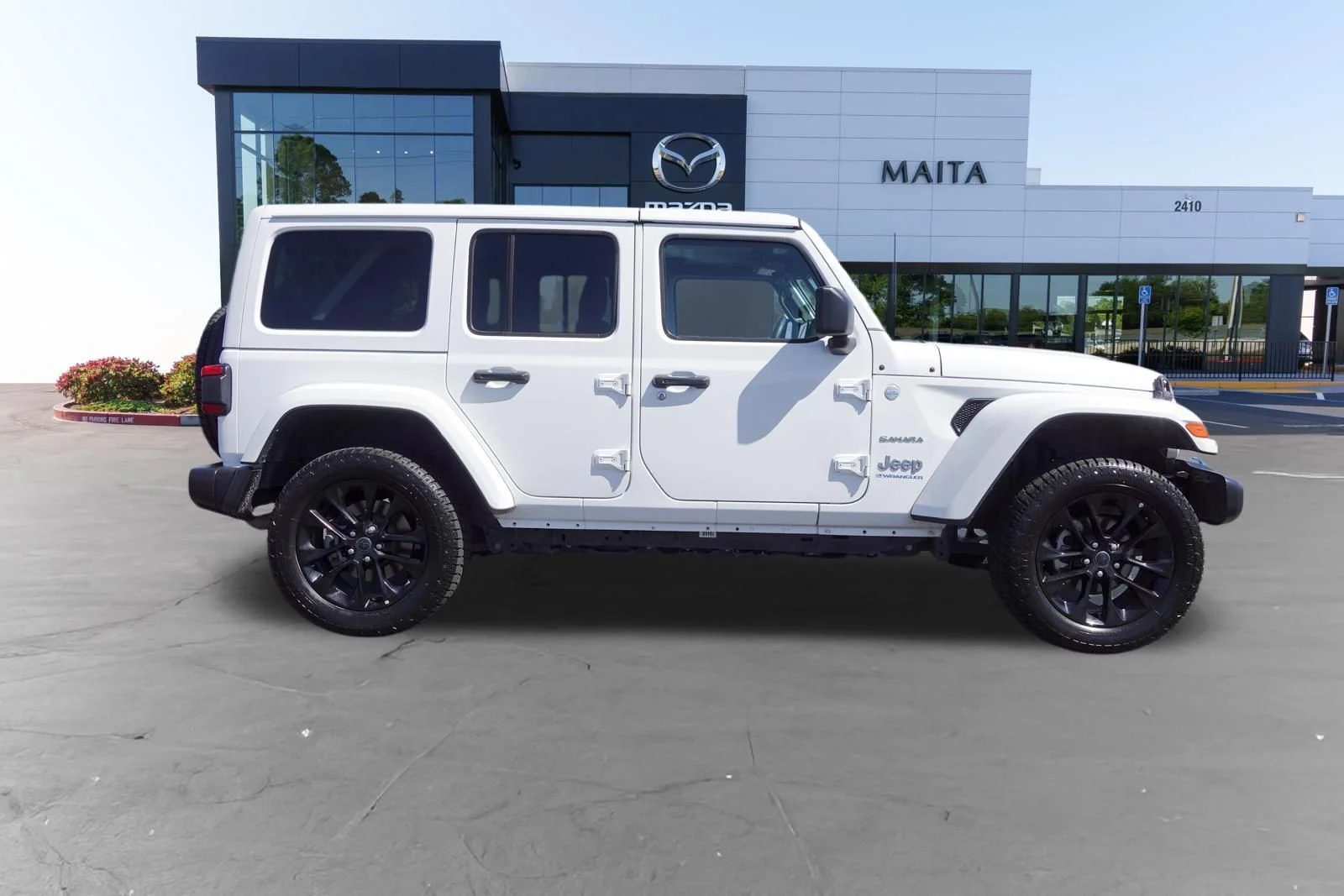 Used 2024 Bright White Clearcoat Jeep Sahara 4xe image 2