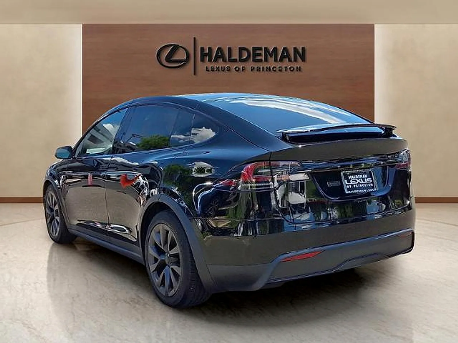 Used 2024 Solid Black Tesla Long Range image 4