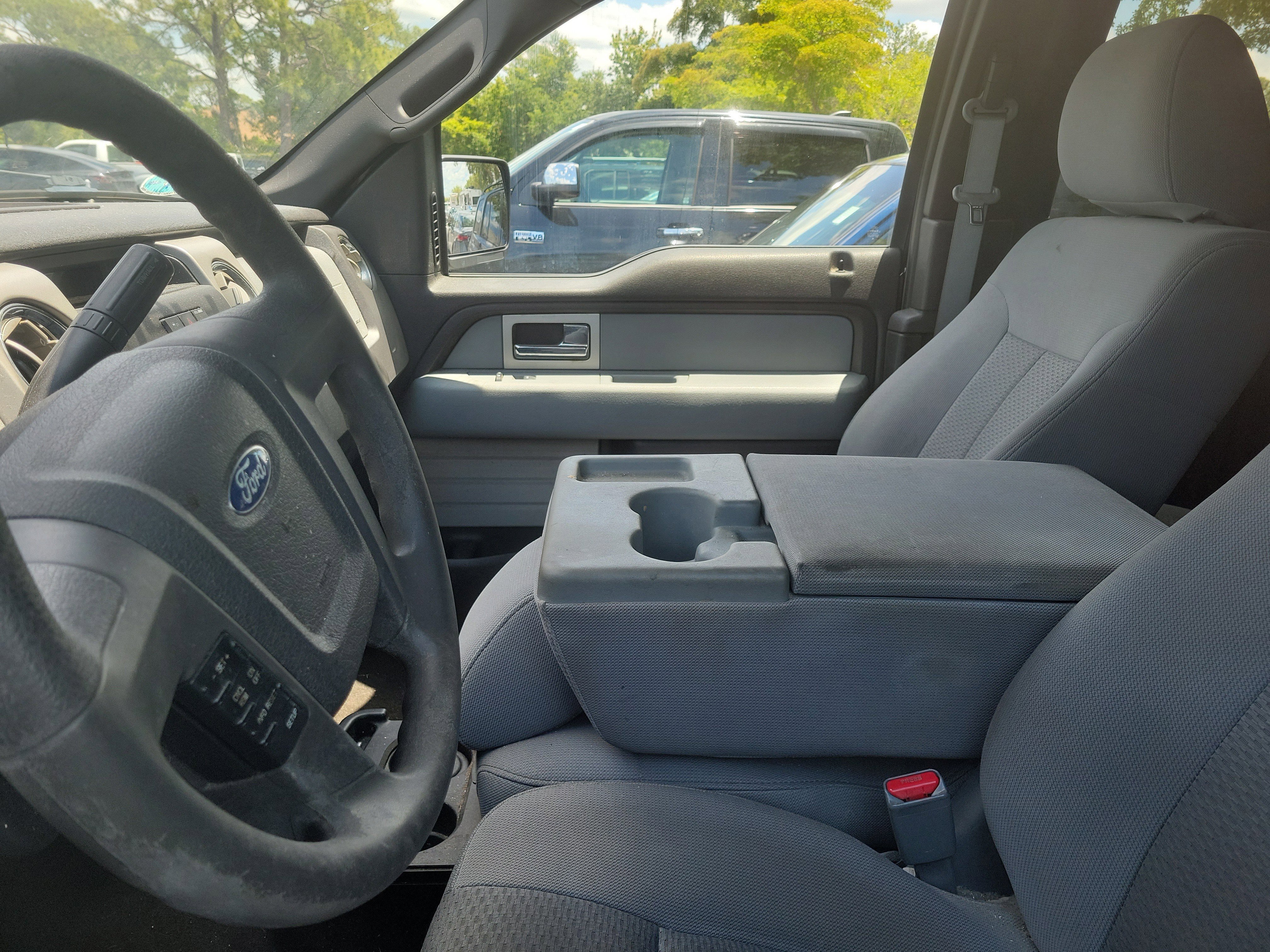 Used 2011 Tuxedo Black Metallic Ford XLT image 8