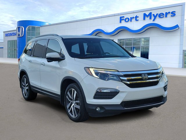 Used 2018 White Diamond Pearl Honda Touring image 1