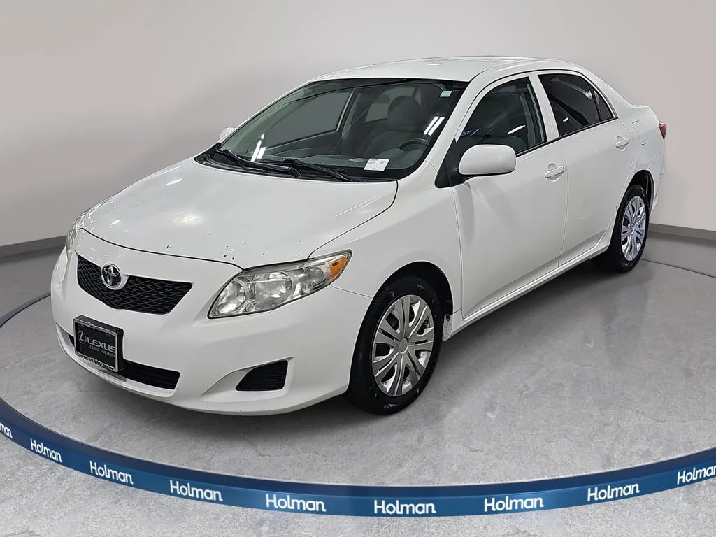 Used 2010 White Toyota LE image 1