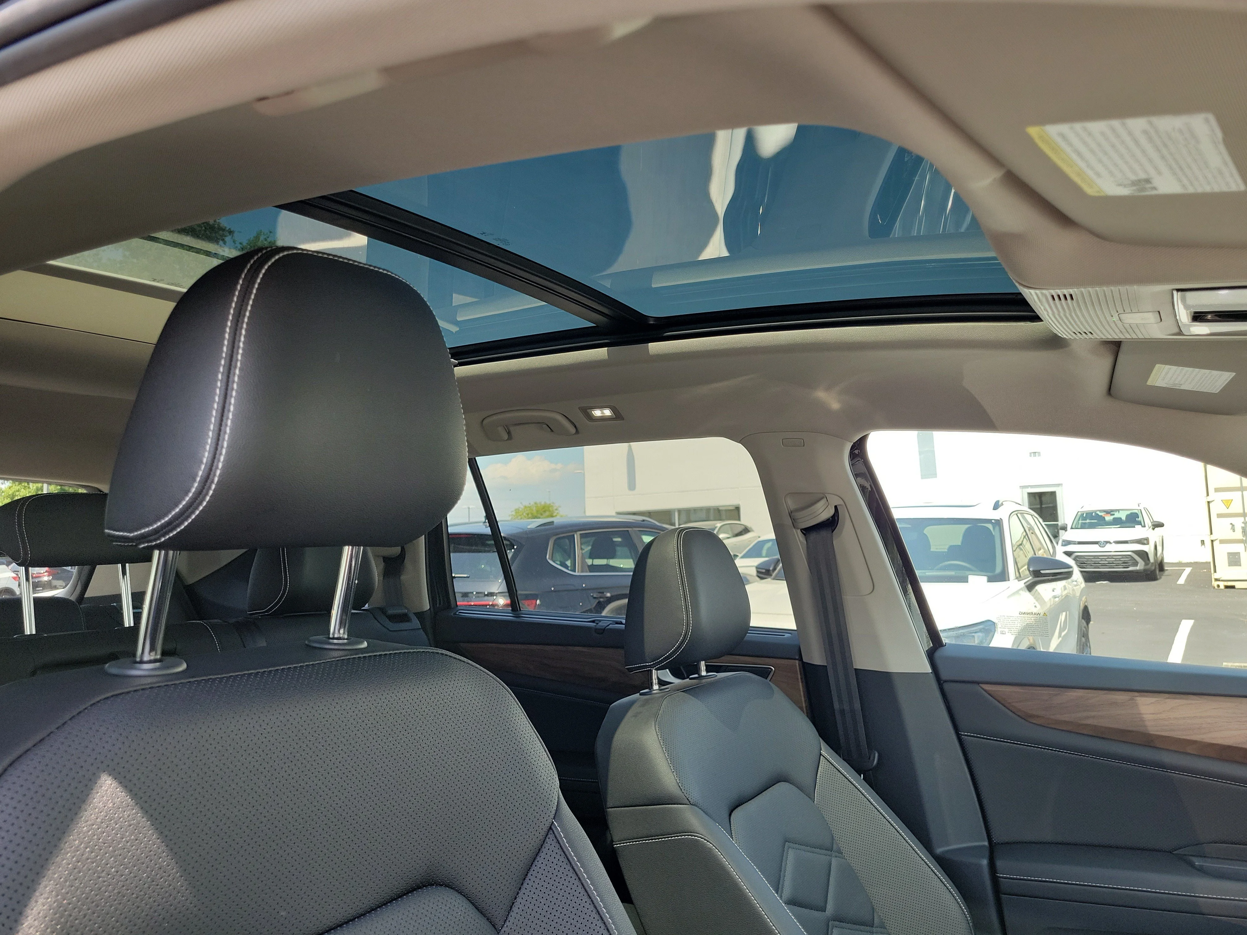 New 2026 Black Volkswagen SE w/Technology image 9