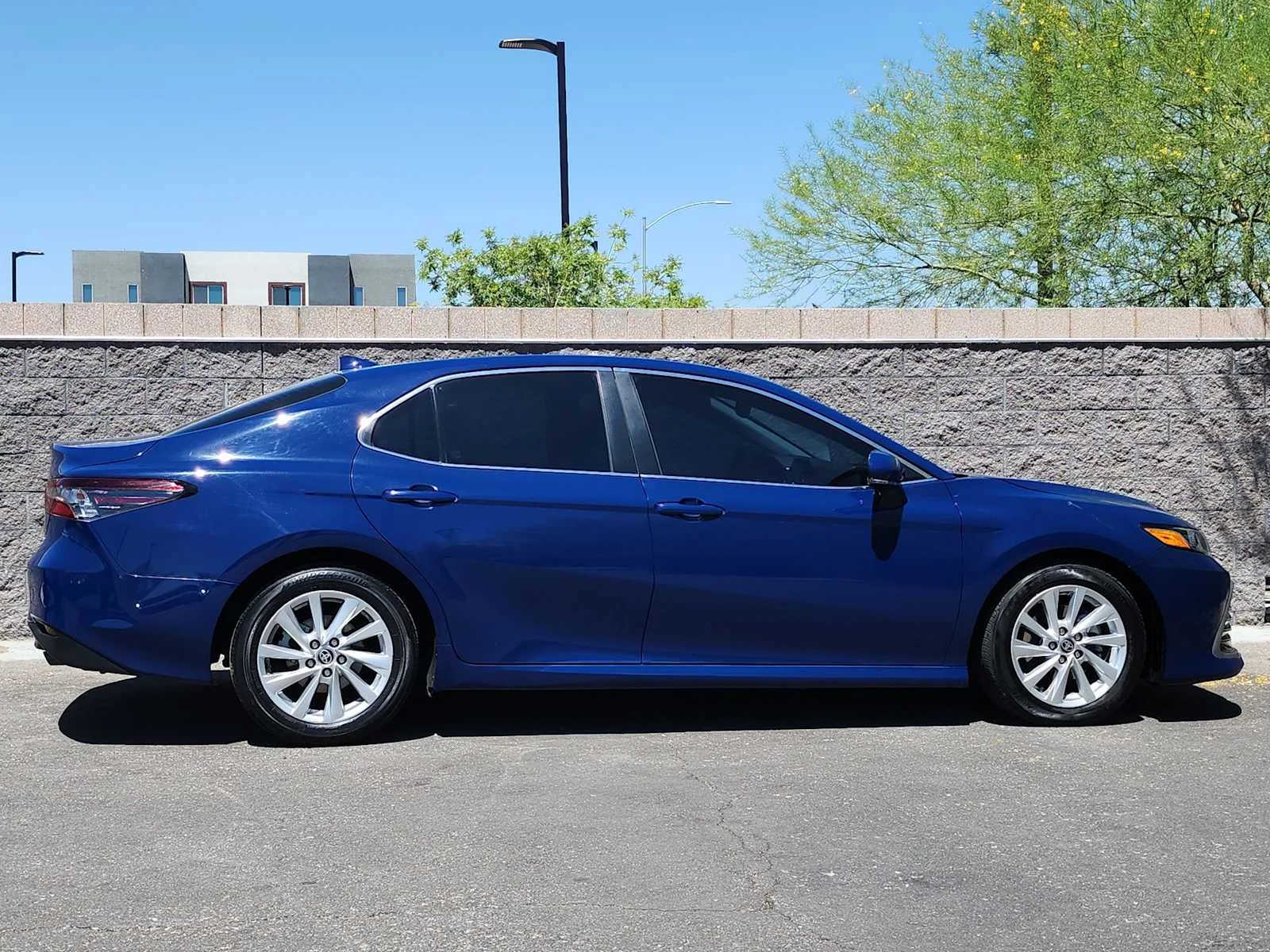 Used 2023 Reservoir Blue Toyota LE image 9